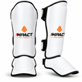 White IMPACT shin guards front and angled side views, matching branding