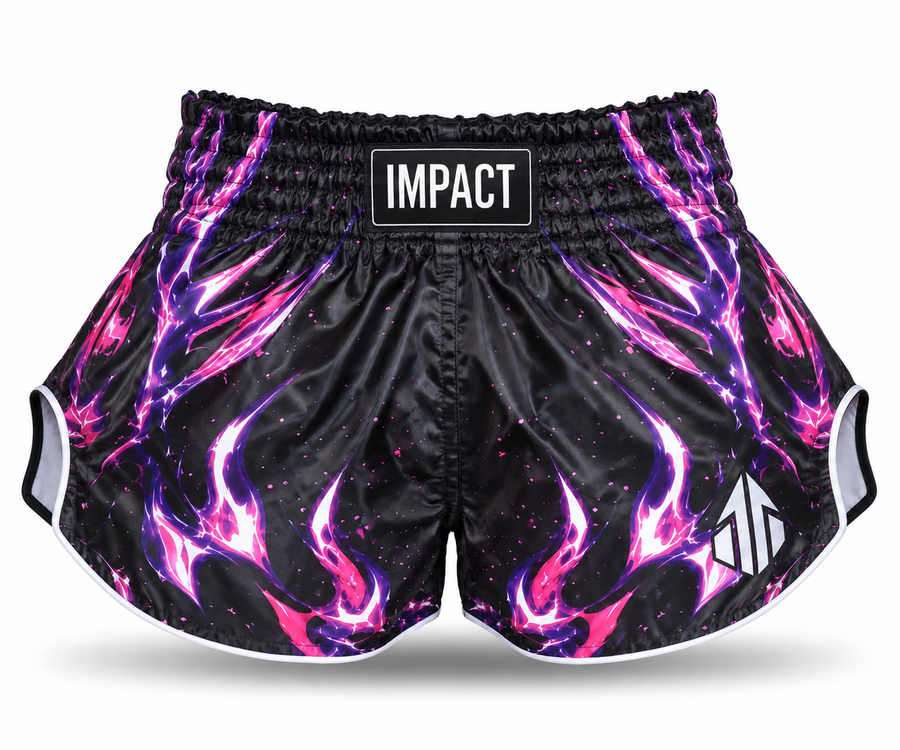Black and pink IMPACT Muay Thai shorts with magenta-purple flames, high curved hems and centered IMPACT waistband