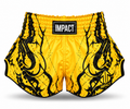Yellow and black IMPACT Muay Thai shorts with black graphic flourishes and curved high-cut hems